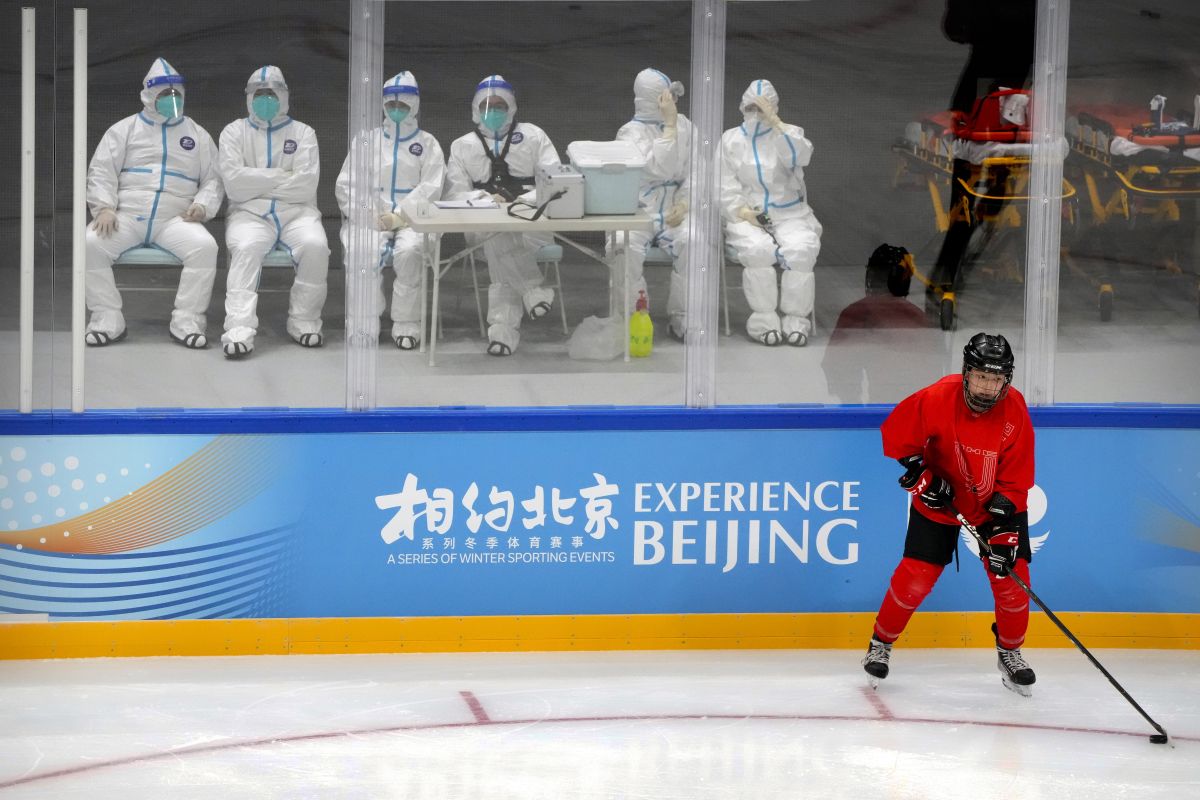 Manifestation test en novembre 2021 au National Indoor Stadium à Pékin. Photo : KEYSTONE/ AP Photo/ Mark Schiefelbein Manifestation test en novembre 2021 au National Indoor Stadium à Pékin. Photo : KEYSTONE/ AP Photo/ Mark Schiefelbein